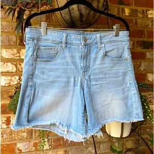 American Eagle light wash distressed denim shorts size 12